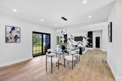 Stunning New Waterfront Construction with Sweeping Water Views - photo 25