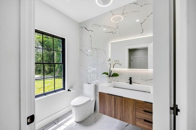 Stunning New Waterfront Construction with Sweeping Water Views - photo 32