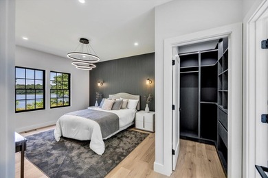 Stunning New Waterfront Construction with Sweeping Water Views - photo 33