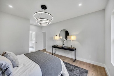 Stunning New Waterfront Construction with Sweeping Water Views - photo 36