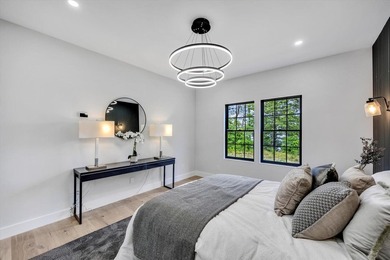 Stunning New Waterfront Construction with Sweeping Water Views - photo 37