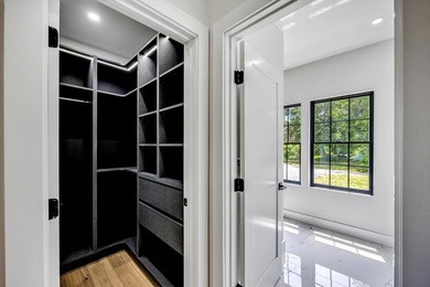 Stunning New Waterfront Construction with Sweeping Water Views - photo 38