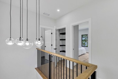 Stunning New Waterfront Construction with Sweeping Water Views - photo 43
