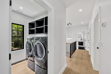 Stunning New Waterfront Construction with Sweeping Water Views - photo 44