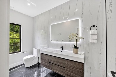 Stunning New Waterfront Construction with Sweeping Water Views - photo 46