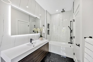 Stunning New Waterfront Construction with Sweeping Water Views - photo 47