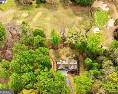 Offered for the first time, this custom-designed home captures - photo 8