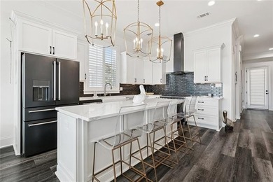 Luxury living on the beautiful Tchefuncte River! 
This stunning