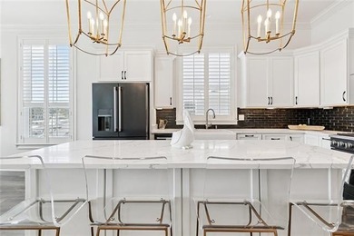 Luxury living on the beautiful Tchefuncte River! 
This stunning