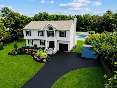 Welcome to an extraordinary custom-built Colonial situated on an - photo 1