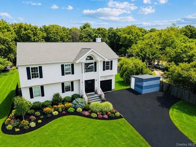 Welcome to an extraordinary custom-built Colonial situated on an - photo 2