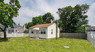 This Cute N' Cozy two-bedroom ranch is priced right with L-O-W - photo 1