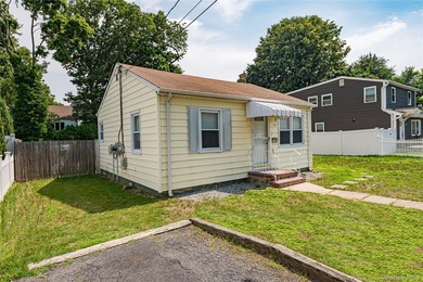 This Cute N' Cozy two-bedroom ranch is priced right with L-O-W - photo 2