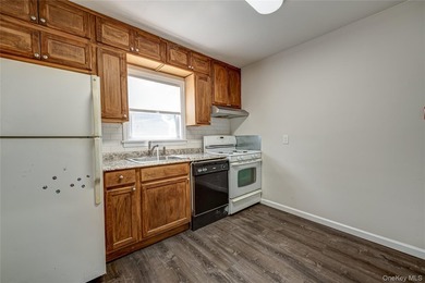 This Cute N' Cozy two-bedroom ranch is priced right with L-O-W - photo 5