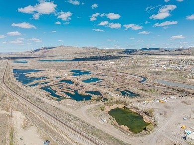 Situated between the railroad tracks and the Humboldt River - photo 3