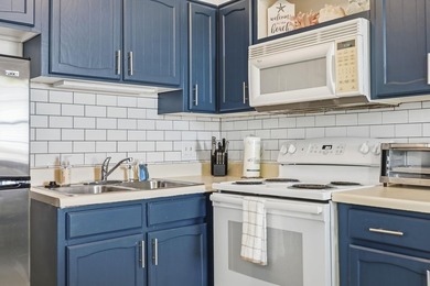 Welcome to the Coast! This 2 bedroom, 2 bathroom condo, is - photo 15