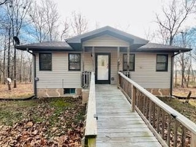 WOW LOOK AT THIS ONE! Beautiful 3 bedroom 2 bath home on 5 acres