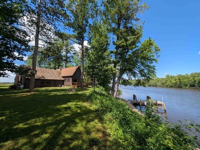 BEAUTIFUL Wolf River acre with 150 ft of frontage in the Town of - photo 1