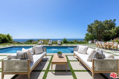 Wide open ocean views, a huge lush yard, and a resort-style - photo 4
