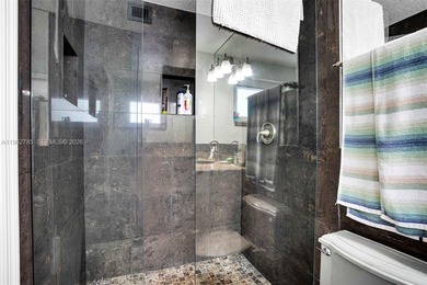 Welcome to this beautifully updated and fully furnished 2BR/2BA