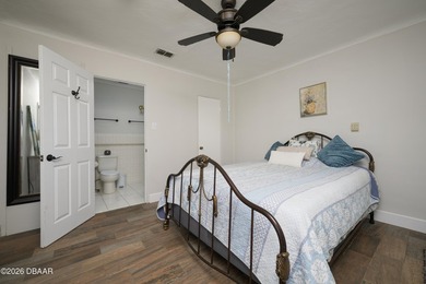 Set on natural elevation this coastal home captures an - photo 22