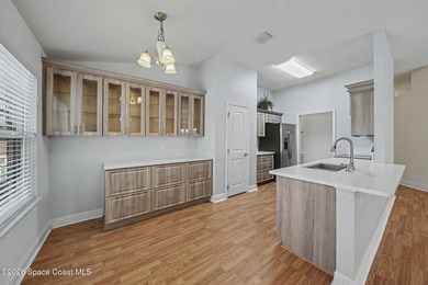 Welcome to this beautifully updated waterfront pool home located - photo 11