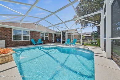 Welcome to this beautifully updated waterfront pool home located - photo 25