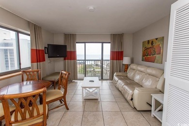 This cozy updated 1-bedroom, 1.5-bath oceanview end unit in