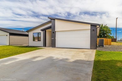 Modern ranch style one-story home with level entry. Built in