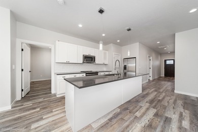 Modern ranch style one-story home with level entry. Built in