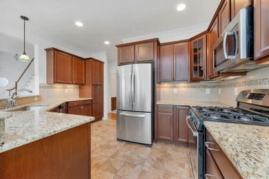 Welcome to this beautifully maintained end unit offering comfort - photo 10