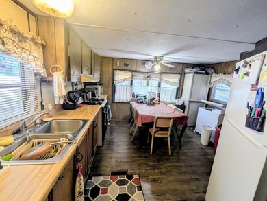 Quiet and peaceful!! This 2 bedroom single wide mobile home is - photo 5