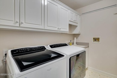 Lakefront living doesn't get better than this. Nestled on the - photo 11
