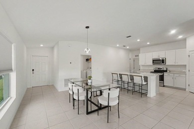 Discover this 4-bedroom, 2-bathroom single-family residence in - photo 16