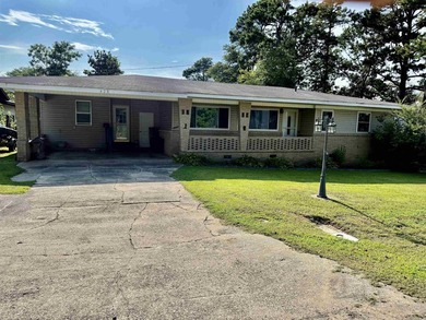 Welcome home to this charming 3-bedroom 2-bath home in a - photo 1
