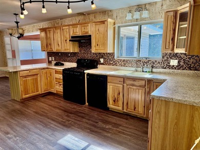 Welcome home to this charming 3-bedroom 2-bath home in a - photo 4