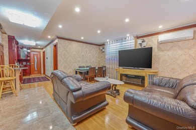 Discover this beautifully renovated legal two-family home in the - photo 15