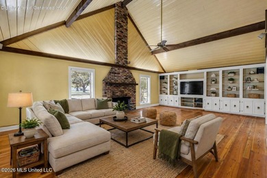 Set on 2.36 acres shaded by beautiful oak trees, this Gulfport - photo 9