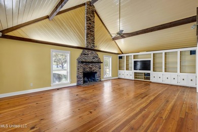 Set on 2.36 acres shaded by beautiful oak trees, this Gulfport - photo 10