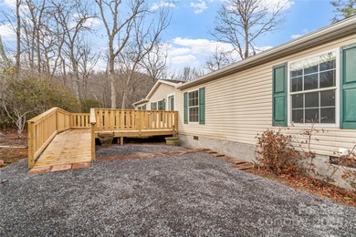 Tucked away on a beautiful 1.06-acre lot, this home invites you