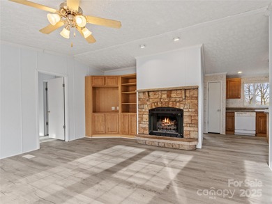 Tucked away on a beautiful 1.06-acre lot, this home invites you