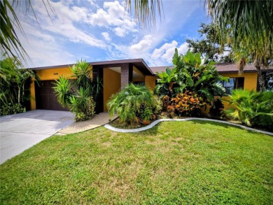 Lake Home For Sale in Holiday, Florida
