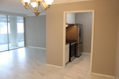 Updated and move-in ready 2nd floor condo featuring marble