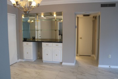 Updated and move-in ready 2nd floor condo featuring marble