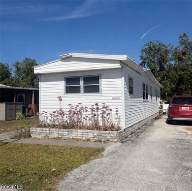 Located in the Coastal Estates, this 2-bedroom, 1.5bath modular - photo 1