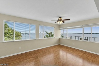 Third floor unit directly on the Caloosahatchee River with broad - photo 1