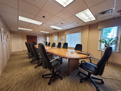 This +-6,120 square foot, two-story property spans three parcels