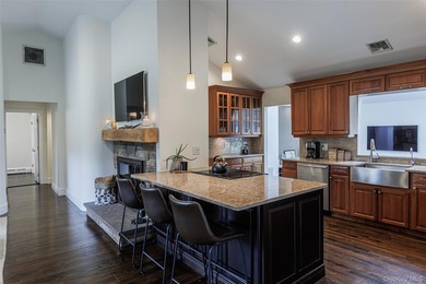 Tucked away on a lush, private three-quarter acre in the highly - photo 12