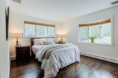 Tucked away on a lush, private three-quarter acre in the highly - photo 24