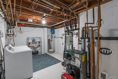 Tucked away on a lush, private three-quarter acre in the highly - photo 35